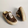 Zapatilla tipo sabot Space-Star para mujer en piel de potro con estampado de leopardo y estrella negra