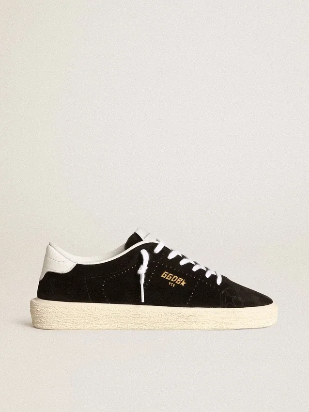 Zapatillas de tenis para mujer en gamuza negra con lengüeta de talón de cuero blanco