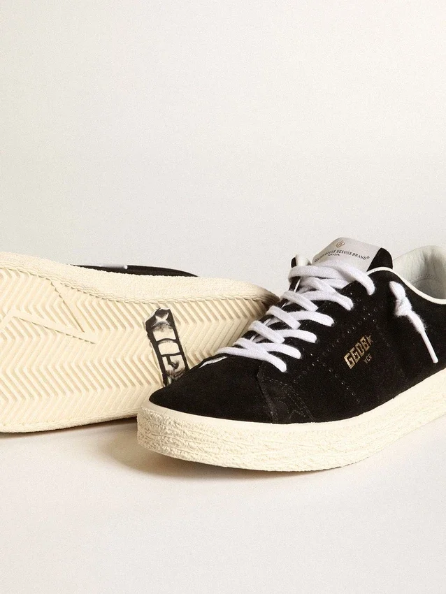 Zapatillas de tenis para mujer en gamuza negra con lengüeta de talón de cuero blanco