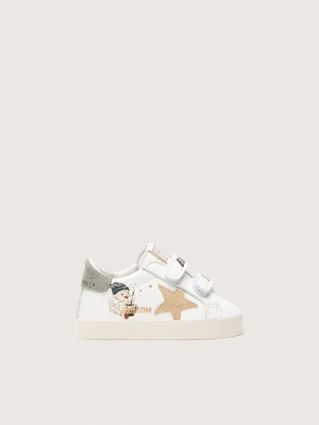 Zapatillas escolares para bebé en napa con estrella de gamuza beige y estampado de mascota
