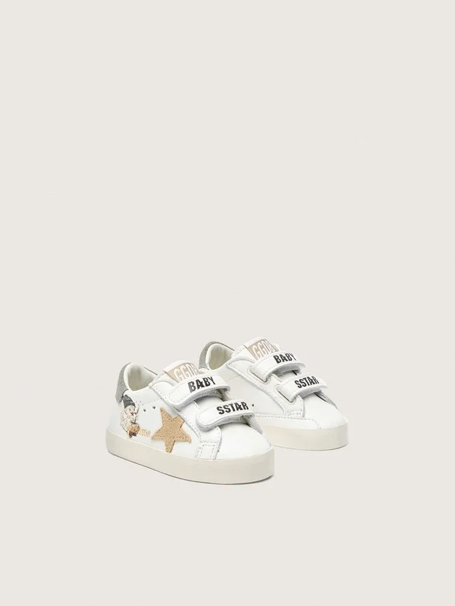 Zapatillas escolares para bebé en napa con estrella de gamuza beige y estampado de mascota