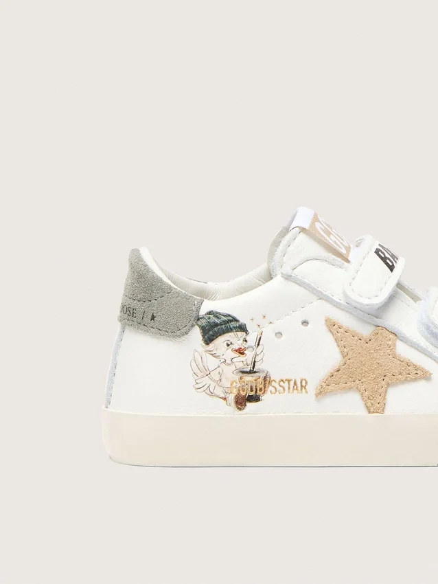 Zapatillas escolares para bebé en napa con estrella de gamuza beige y estampado de mascota