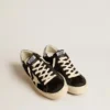 Zapatillas Hi Star para mujer en cuero negro con lengüeta del talón con purpurina plateada