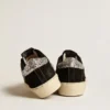 Zapatillas Hi Star para mujer en cuero negro con lengüeta del talón con purpurina plateada