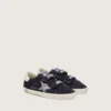 Zapatillas Junior Old School en gamuza azul con estrella plateada con purpurina y lengüeta de cuero blanco en el talón