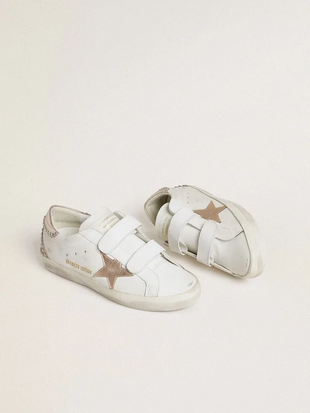 Zapatillas Old School LTD para mujer con estrella y lengüeta en el talón de cuero metalizado en oro rosa