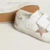 Zapatillas Old School LTD para mujer con estrella y lengüeta en el talón de cuero metalizado en oro rosa