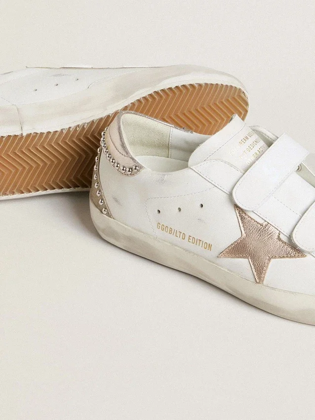 Zapatillas Old School LTD para mujer con estrella y lengüeta en el talón de cuero metalizado en oro rosa