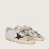 Zapatillas Old School para mujer en cuero blanco con estrella de cuero negro e inserciones con estampado de serpiente