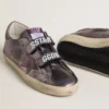Zapatillas Old School para mujer en cuero laminado morado con estrella de nubuck lila y lengüeta en el talón
