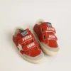 Zapatillas Old School para niños en napa naranja con estrella blanca y lengüeta del talón de cuero color crema