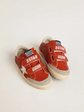 Zapatillas Old School para niños en napa naranja con estrella blanca y lengüeta del talón de cuero color crema