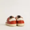 Zapatillas Old School para niños en napa naranja con estrella blanca y lengüeta del talón de cuero color crema