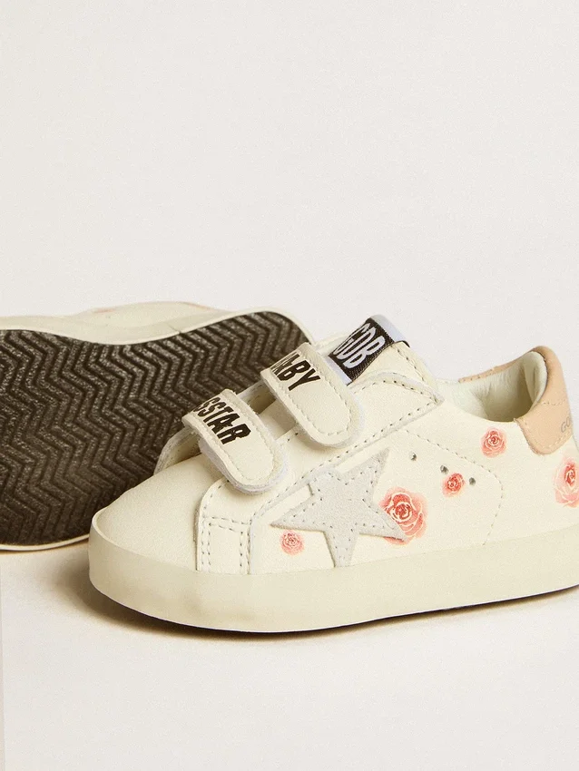 Zapatillas para bebé en piel napa con motivo de rosas rosas y estrella de gamuza blanca