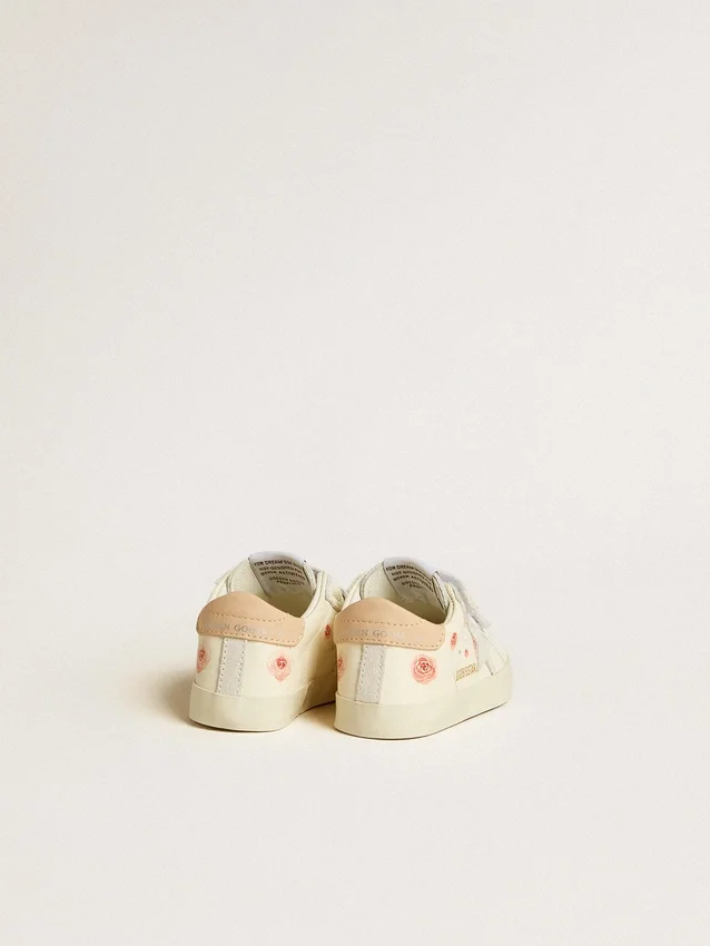 Zapatillas para bebé en piel napa con motivo de rosas rosas y estrella de gamuza blanca