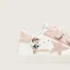 Zapatillas para bebés en napa con estrella de gamuza rosa y estampado de mascotas