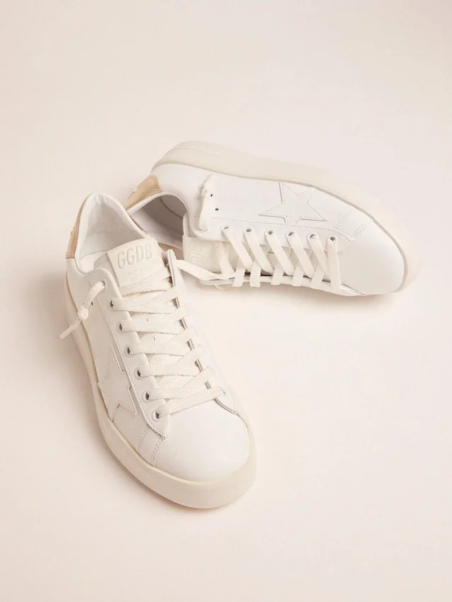 Zapatillas Purestar para mujer con lengüeta en el talón de color dorado