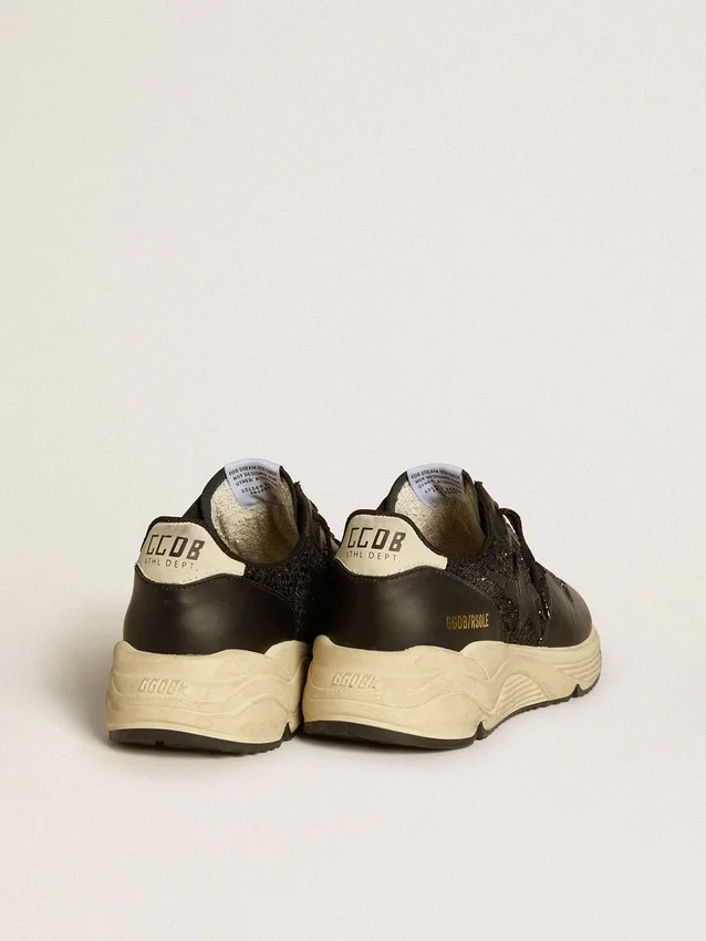 Zapatillas Running Sole para mujer en negro con purpurina, estrella de cuero y lengüeta de talón de nubuck