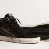 Zapatillas Slide en marrón con purpurina, estrella de cuero negro y detalles brillantes