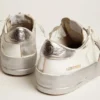 Zapatillas Stardan con estrella de cuero metalizado plateado y lengüeta en el talón