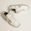 Zapatillas Stardan con estrella de cuero metalizado plateado y lengüeta en el talón