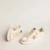 Zapatillas Stardan para mujer en napa y gamuza con estrella rosa con purpurina y lengüeta en el talón