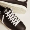 Zapatillas Starter para hombre en cuero con estrella estampada en la lengüeta del talón