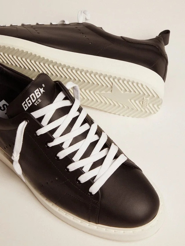 Zapatillas Starter para hombre en cuero con estrella estampada en la lengüeta del talón