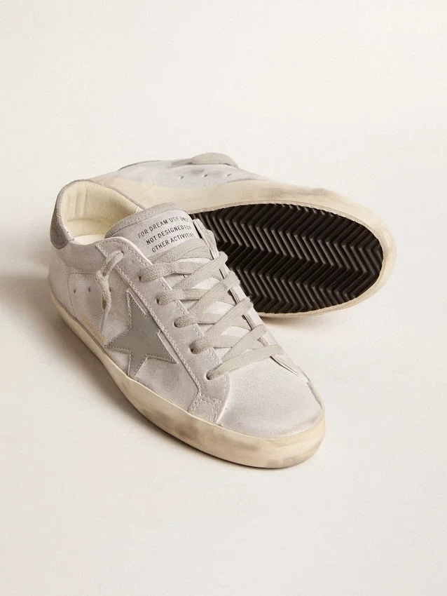 Zapatillas Super-Star en cuero gris-blanco con efecto brillante y estrella de cuero