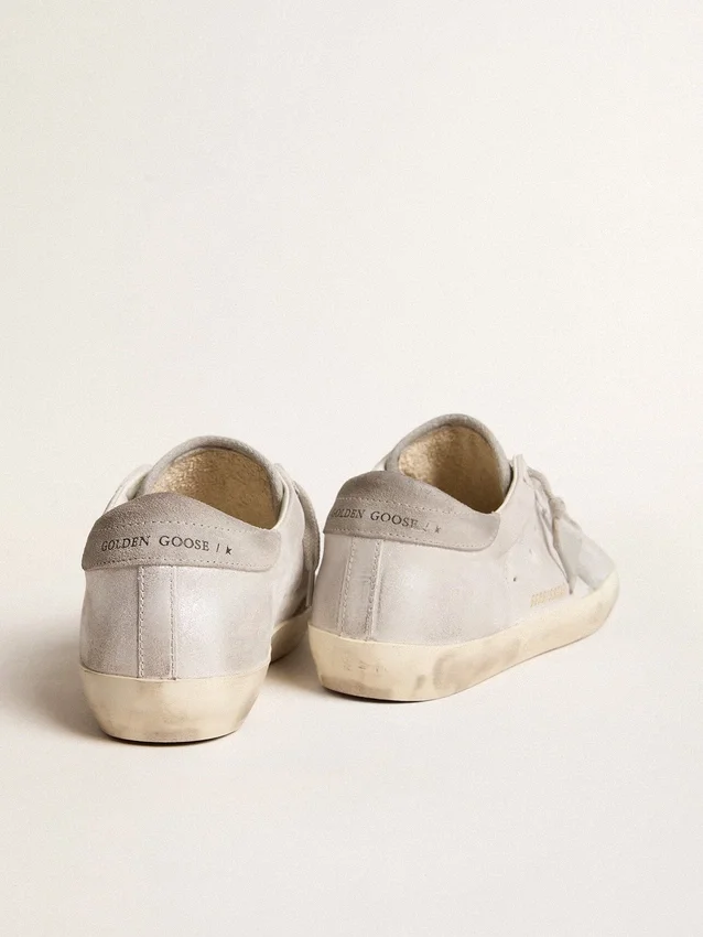 Zapatillas Super-Star en cuero gris-blanco con efecto brillante y estrella de cuero