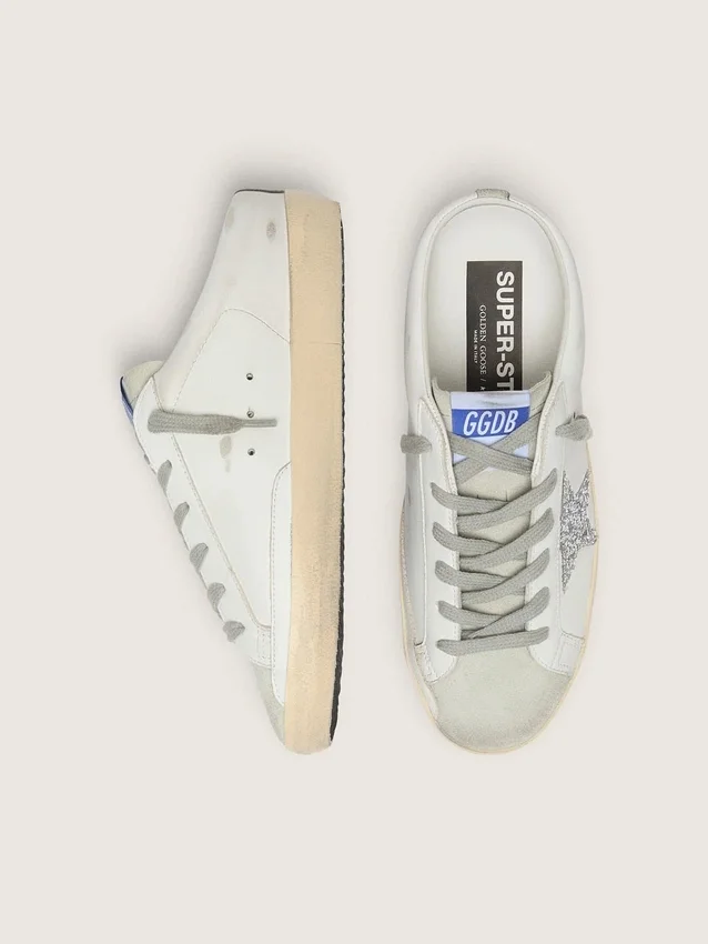 Zapatillas Super-Star Sabot con una estrella de purpurina platino y lengüeta de gamuza