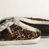 Zapatillas Super-Star Sabot para mujer en piel de potro con estampado de leopardo y estrella negra