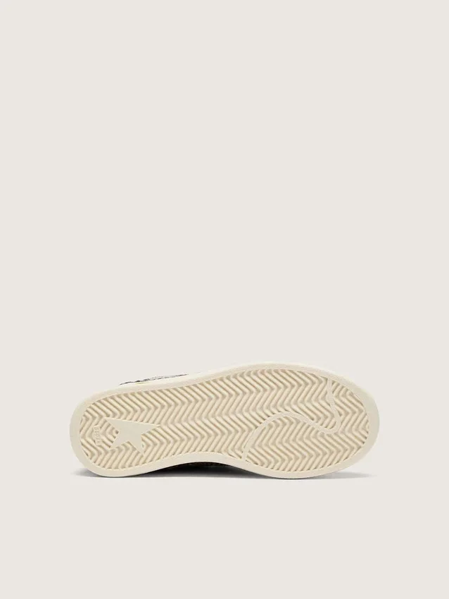 Zapatillas Ball Star para niños en piel de potro con estampado de leopardo en blanco y negro y estrella de cuero color crema