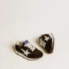 Zapatillas Young Marathon de nylon negro con estrella estampada y lengüeta de cuero en el talón