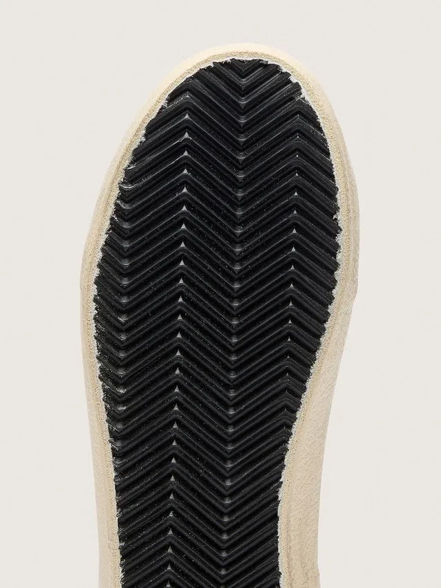 Zapatillas Young Old School con estrella de cuero negro e inserciones de gamuza beige y verde