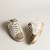 Zapatos tipo Super-Star Sabot con estrella de cuero blanco y forro de piel de oveja